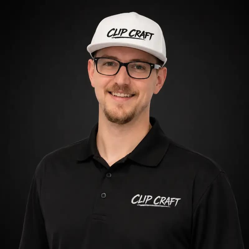 The founder of ClipCraft AI, wearing a CLIP CRAFT cap and polo